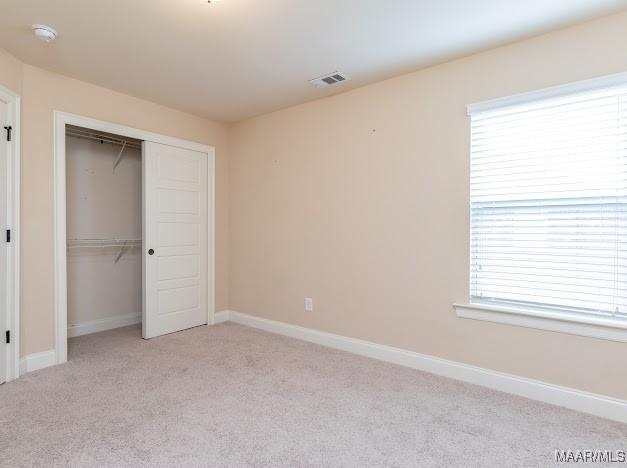 1531 Wingate Park Ct, Montgomery, AL 36117 - unfurnished bedroom featuring light carpet and a closet