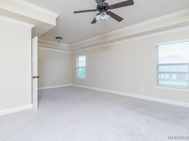 1531 Wingate Park Ct, Montgomery, AL 36117 - spare room featuring light carpet, ornamental molding, and a ceiling fan