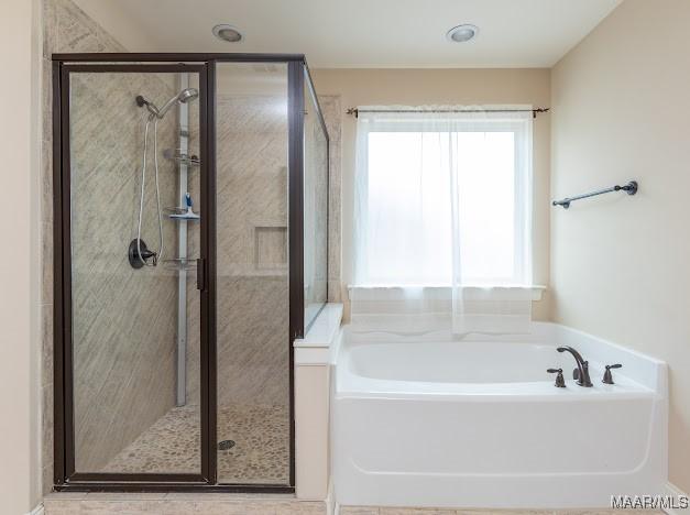 1531 Wingate Park Ct, Montgomery, AL 36117 - bathroom featuring a garden tub and a stall shower