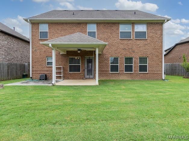 1531 Wingate Park Ct, Montgomery, AL 36117 - rear view of property with a ceiling fan, a patio, a fenced backyard, and brick siding