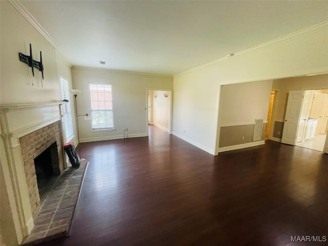 1604 Salisbury Dr, Montgomery, AL 36117 - unfurnished living room featuring a fireplace, crown molding, and wood finished floors