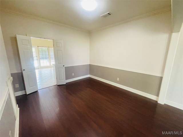 1604 Salisbury Dr, Montgomery, AL 36117 - empty room featuring dark wood-type flooring and ornamental molding
