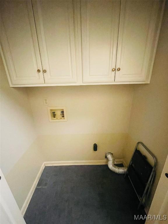 1604 Salisbury Dr, Montgomery, AL 36117 - washroom with carpet floors, cabinet space, and washer hookup