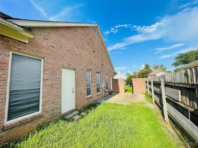 1604 Salisbury Dr, Montgomery, AL 36117 - view of home's exterior with a patio and brick siding