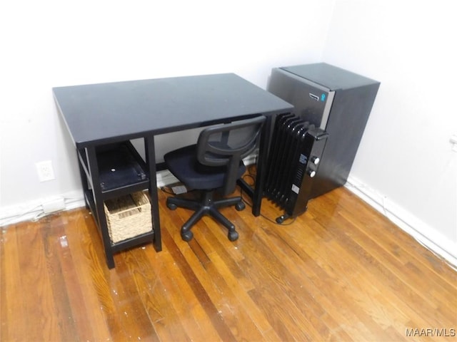 304 Patterson St, Tuskegee, AL 36088 - office featuring wood finished floors