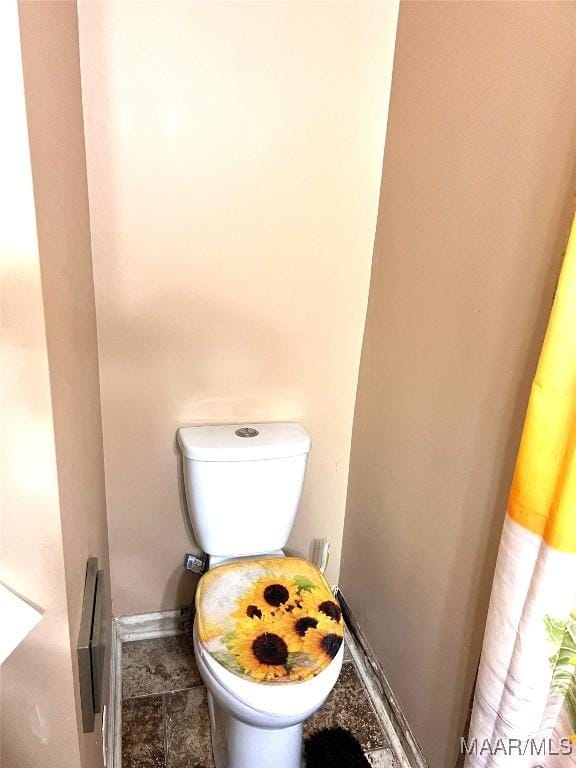 3628 Bankhead Ave, Montgomery, AL 36111 - bathroom featuring toilet and baseboards