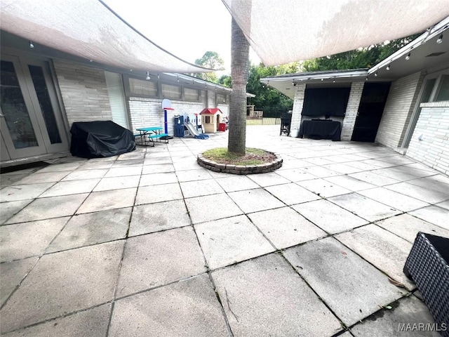 3628 Bankhead Ave, Montgomery, AL 36111 - view of patio with a grill and french doors