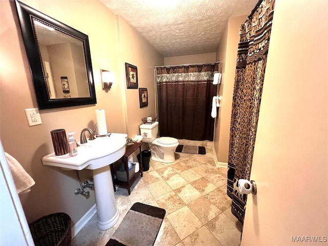 3628 Bankhead Ave, Montgomery, AL 36111 - bathroom with a textured ceiling and a shower with curtain