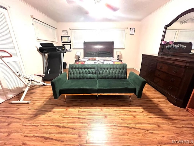 3628 Bankhead Ave, Montgomery, AL 36111 - bedroom featuring wood finished floors, crown molding, and a ceiling fan