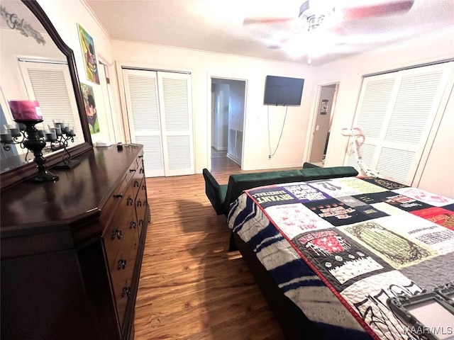 3628 Bankhead Ave, Montgomery, AL 36111 - bedroom with dark wood-style floors, ornamental molding, and ceiling fan