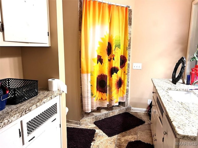 3628 Bankhead Ave, Montgomery, AL 36111 - bathroom with vanity and a shower with shower curtain