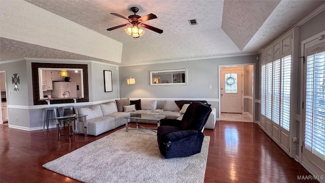 6537 Monmouth Mews, Montgomery, AL 36117 - living room featuring wood finished floors, a textured ceiling, healthy amount of natural light, a ceiling fan, and crown molding