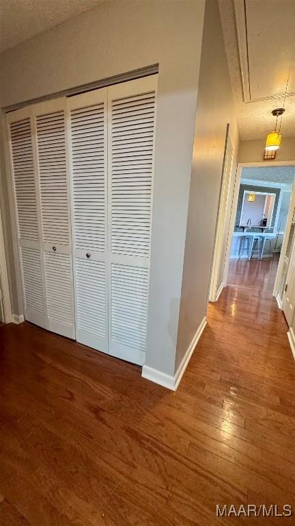 6537 Monmouth Mews, Montgomery, AL 36117 - hall with attic access and wood finished floors