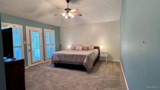 6537 Monmouth Mews, Montgomery, AL 36117 - bedroom with a textured ceiling, carpet flooring, access to exterior, lofted ceiling, and ceiling fan
