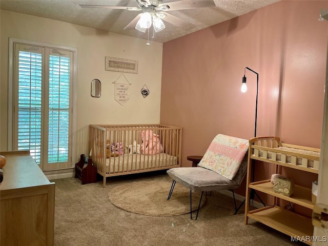 6537 Monmouth Mews, Montgomery, AL 36117 - carpeted bedroom featuring ceiling fan and a textured ceiling