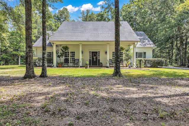 9021 Creek Side Trl, Hope Hull, AL 36043 - view of front facade with a front yard, covered porch, and roof with shingles