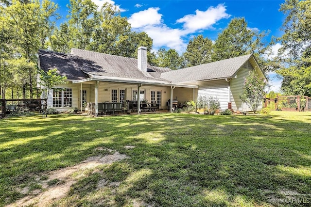 9021 Creek Side Trl, Hope Hull, AL 36043 - rear view of property featuring a chimney and french doors
