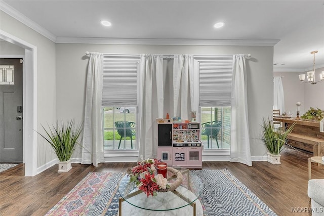 5777 Carriage Barn Ln, Montgomery, AL 36116 - living room featuring wood finished floors, crown molding, healthy amount of natural light, a chandelier, and recessed lighting