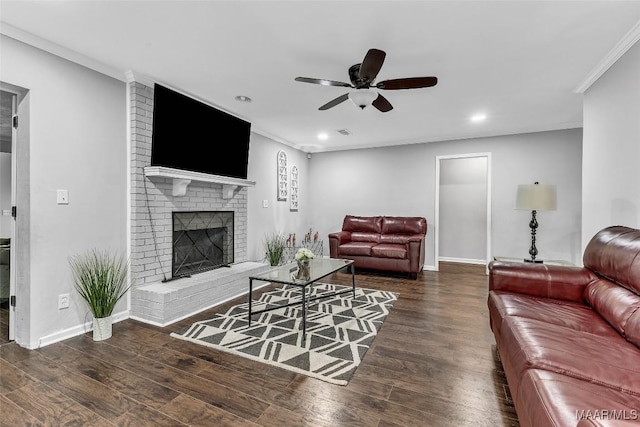 5777 Carriage Barn Ln, Montgomery, AL 36116 - living room featuring wood finished floors, a ceiling fan, a fireplace, ornamental molding, and recessed lighting