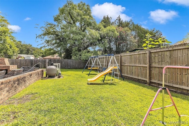 5777 Carriage Barn Ln, Montgomery, AL 36116 - fenced backyard with a playground