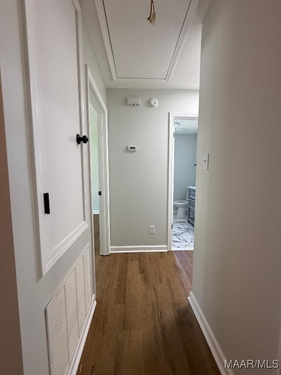 6524 Foxleigh Ct, Montgomery, AL 36116 - corridor with attic access and wood finished floors
