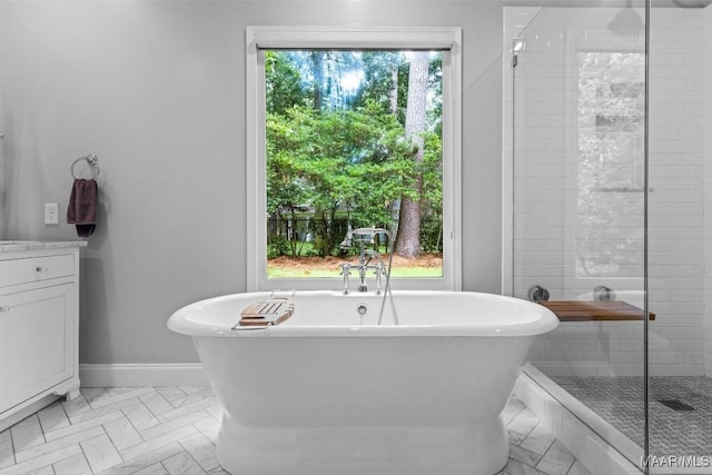 1613 Croom Dr, Montgomery, AL 36106 - bathroom with a freestanding bath, a shower stall, and vanity