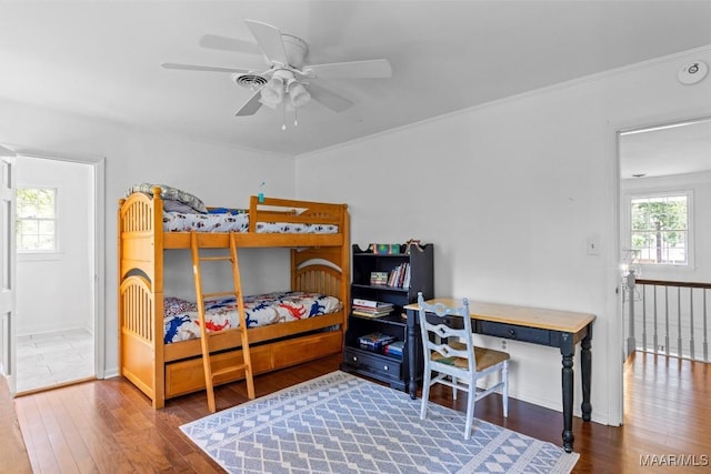 1613 Croom Dr, Montgomery, AL 36106 - bedroom with wood finished floors, ornamental molding, and a ceiling fan