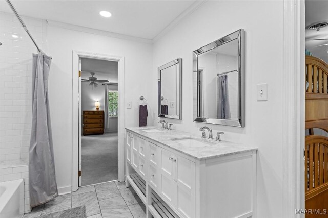 1613 Croom Dr, Montgomery, AL 36106 - bathroom with double vanity, a ceiling fan, marble look tile flooring, shower / tub combo with curtain, and crown molding