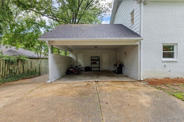 1613 Croom Dr, Montgomery, AL 36106 - view of vehicle parking with driveway and a carport