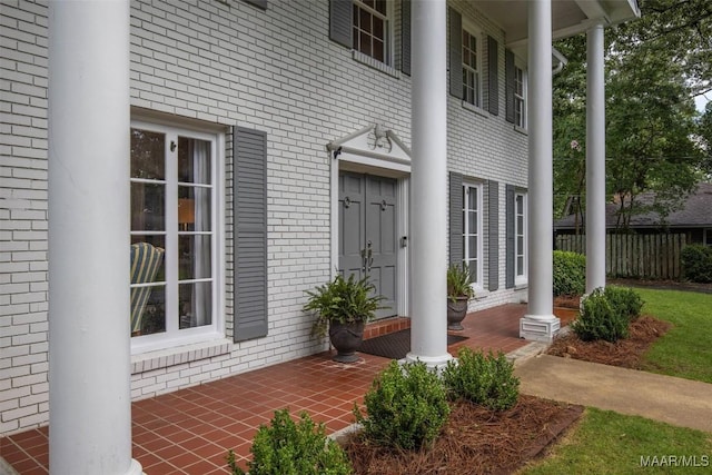 1613 Croom Dr, Montgomery, AL 36106 - entrance to property featuring covered porch and brick siding