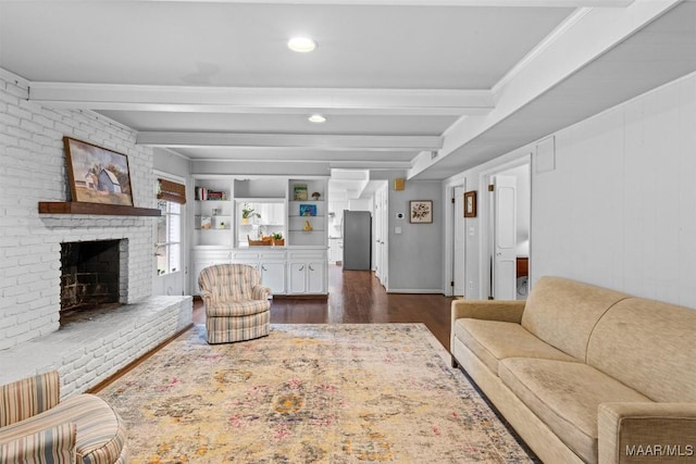 1613 Croom Dr, Montgomery, AL 36106 - living room featuring beamed ceiling, dark wood finished floors, a brick fireplace, and recessed lighting