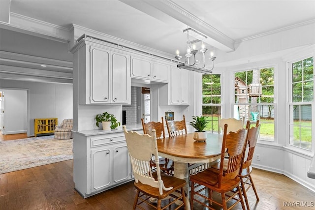 1613 Croom Dr, Montgomery, AL 36106 - dining room with crown molding, a chandelier, plenty of natural light, and dark wood finished floors