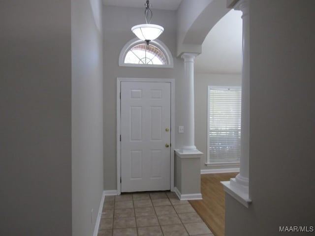 9467 Greythorne Way, Montgomery, AL 36117 - foyer featuring ornate columns, arched walkways, and light tile patterned flooring
