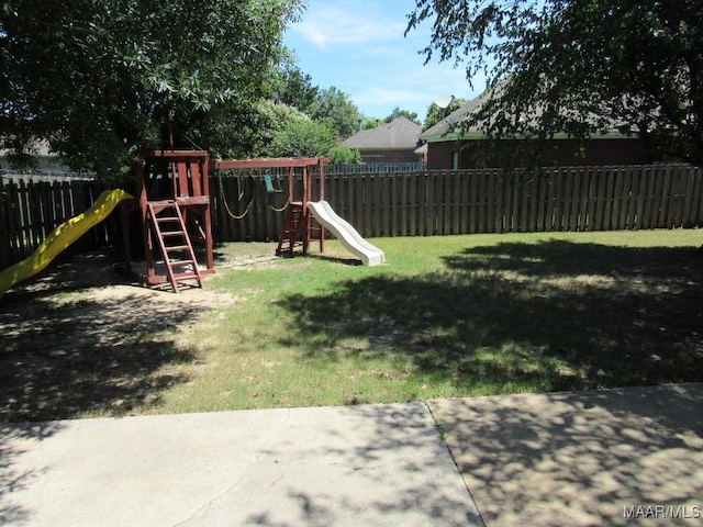 9467 Greythorne Way, Montgomery, AL 36117 - fenced backyard with a playground and a patio area