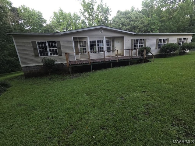 3149 Blackwell Rd, Highland Home, AL 36041 - back of property with a wooden deck and a yard