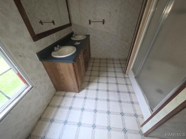 3149 Blackwell Rd, Highland Home, AL 36041 - full bath with double vanity, a shower stall, and tile patterned floors