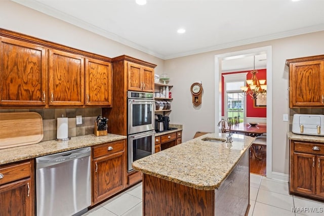 760 Winding Wood Dr, Wetumpka, AL 36093 - kitchen with stainless steel appliances, a center island with sink, light tile patterned floors, open shelves, and light stone countertops
