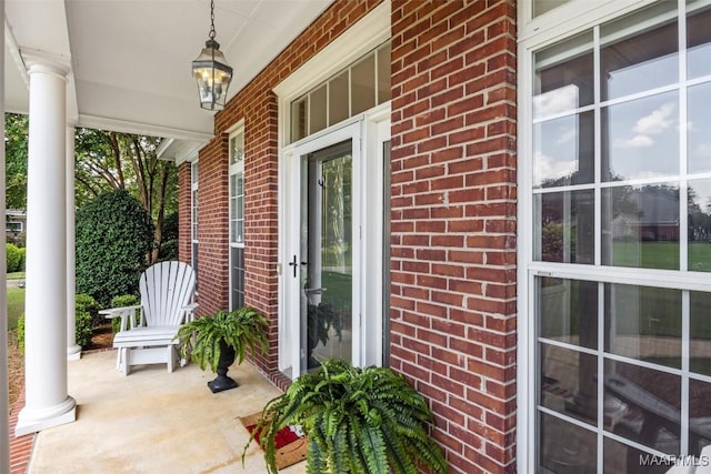 760 Winding Wood Dr, Wetumpka, AL 36093 - doorway to property with brick siding and a porch