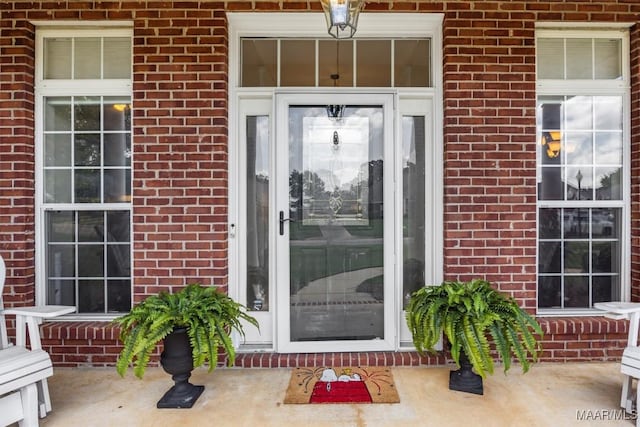 760 Winding Wood Dr, Wetumpka, AL 36093 - doorway to property featuring brick siding and a porch