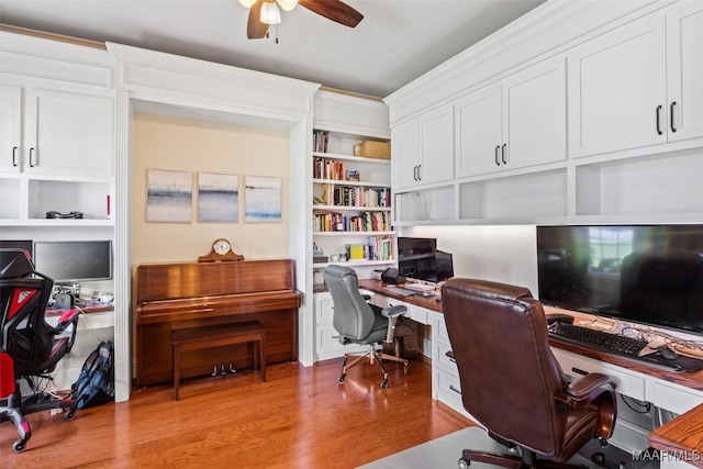 760 Winding Wood Dr, Wetumpka, AL 36093 - home office featuring ceiling fan, wood finished floors, and built in desk