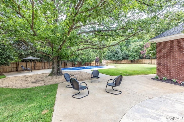 760 Winding Wood Dr, Wetumpka, AL 36093 - fenced backyard featuring a patio area