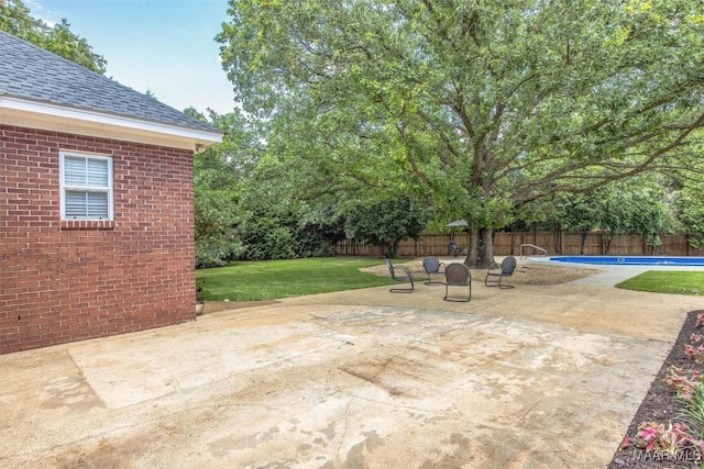 760 Winding Wood Dr, Wetumpka, AL 36093 - fenced backyard with a patio area