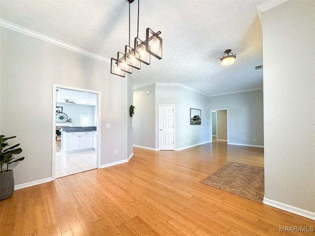 9642 Greythorne Way, Montgomery, AL 36117 - unfurnished living room featuring light wood finished floors and crown molding