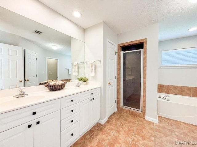 9642 Greythorne Way, Montgomery, AL 36117 - full bath with double vanity, a shower stall, a bath, and tile patterned flooring