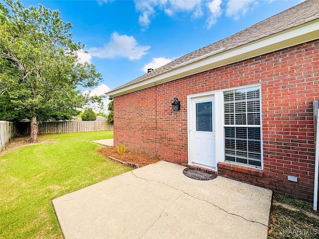 9642 Greythorne Way, Montgomery, AL 36117 - property entrance featuring brick siding, a patio area, and roof with shingles