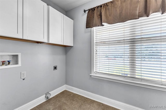 2285 Gathering Way, Prattville, AL 36066 - laundry area featuring hookup for a washing machine, hookup for an electric dryer, cabinet space, tile patterned flooring, and hookup for a gas dryer