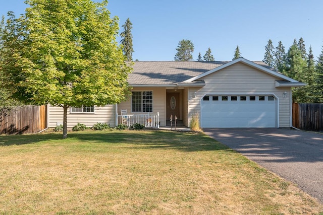772 Cedar St, Whitefish, MT 59937 - ranch-style house featuring driveway, an attached garage, covered porch, and a shingled roof
