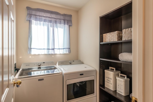 772 Cedar St, Whitefish, MT 59937 - washroom featuring separate washer and dryer