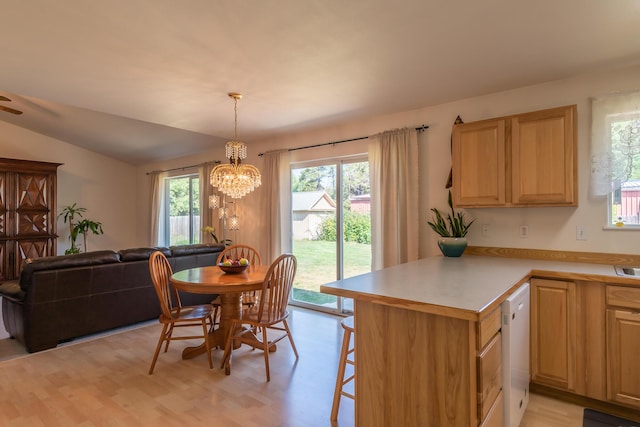 772 Cedar St, Whitefish, MT 59937 - dining space featuring a chandelier and light wood-type flooring