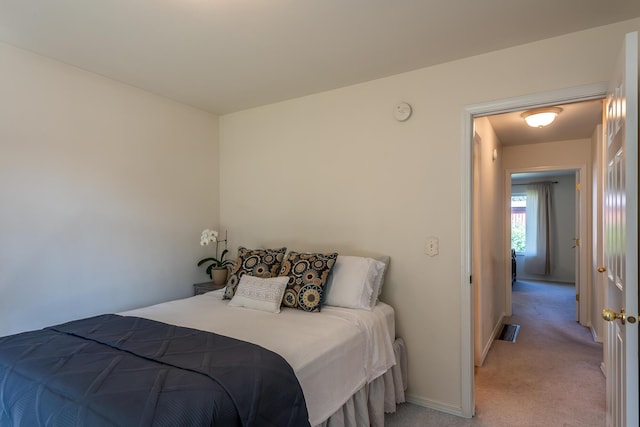 772 Cedar St, Whitefish, MT 59937 - bedroom with light carpet and baseboards